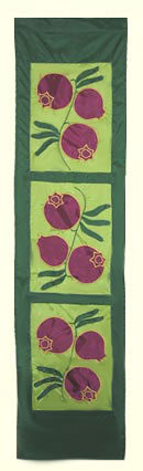 Rich Ruby Maroon Pomegranates appliqued on satiny spring green panels set in deep green background.